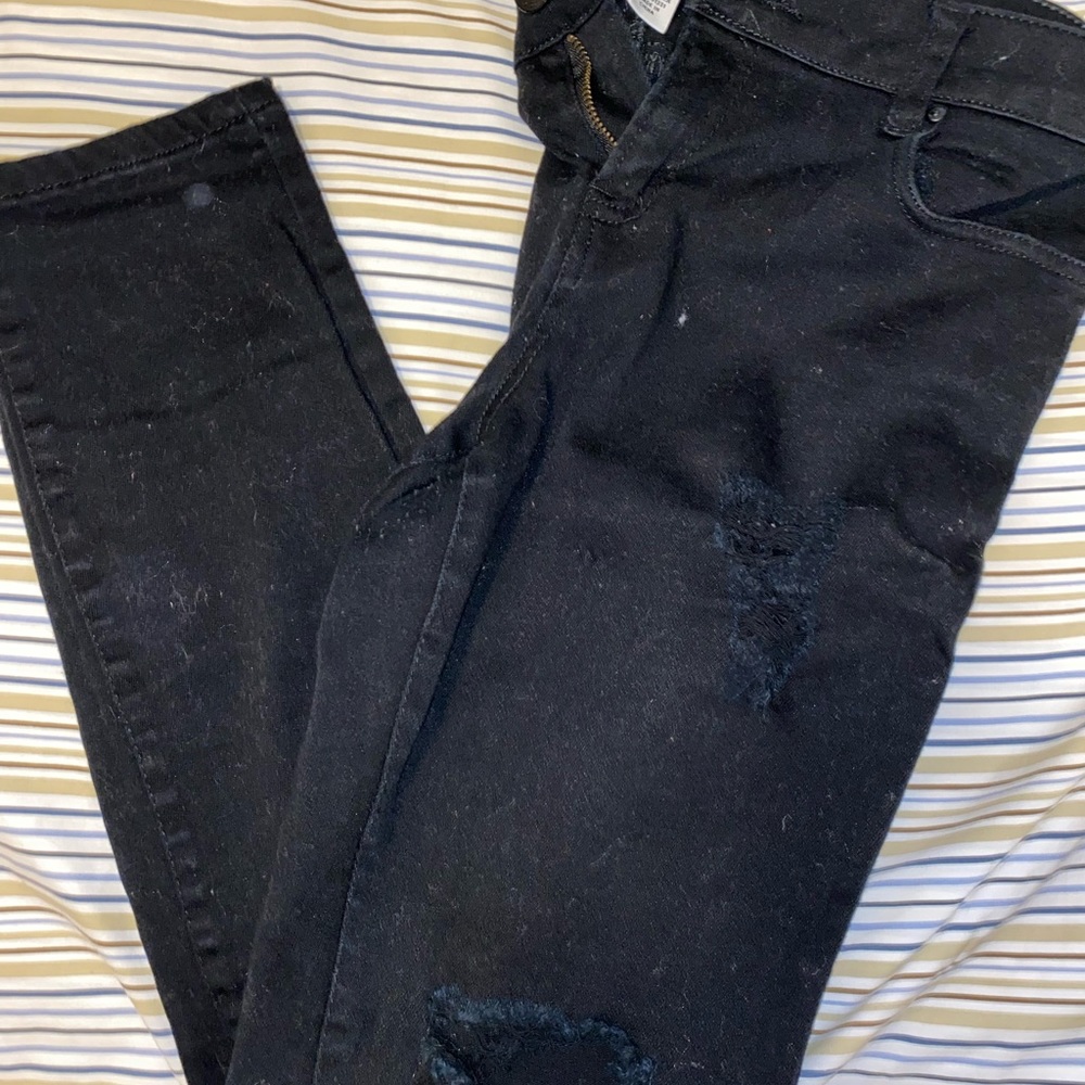 Black ripped jeans